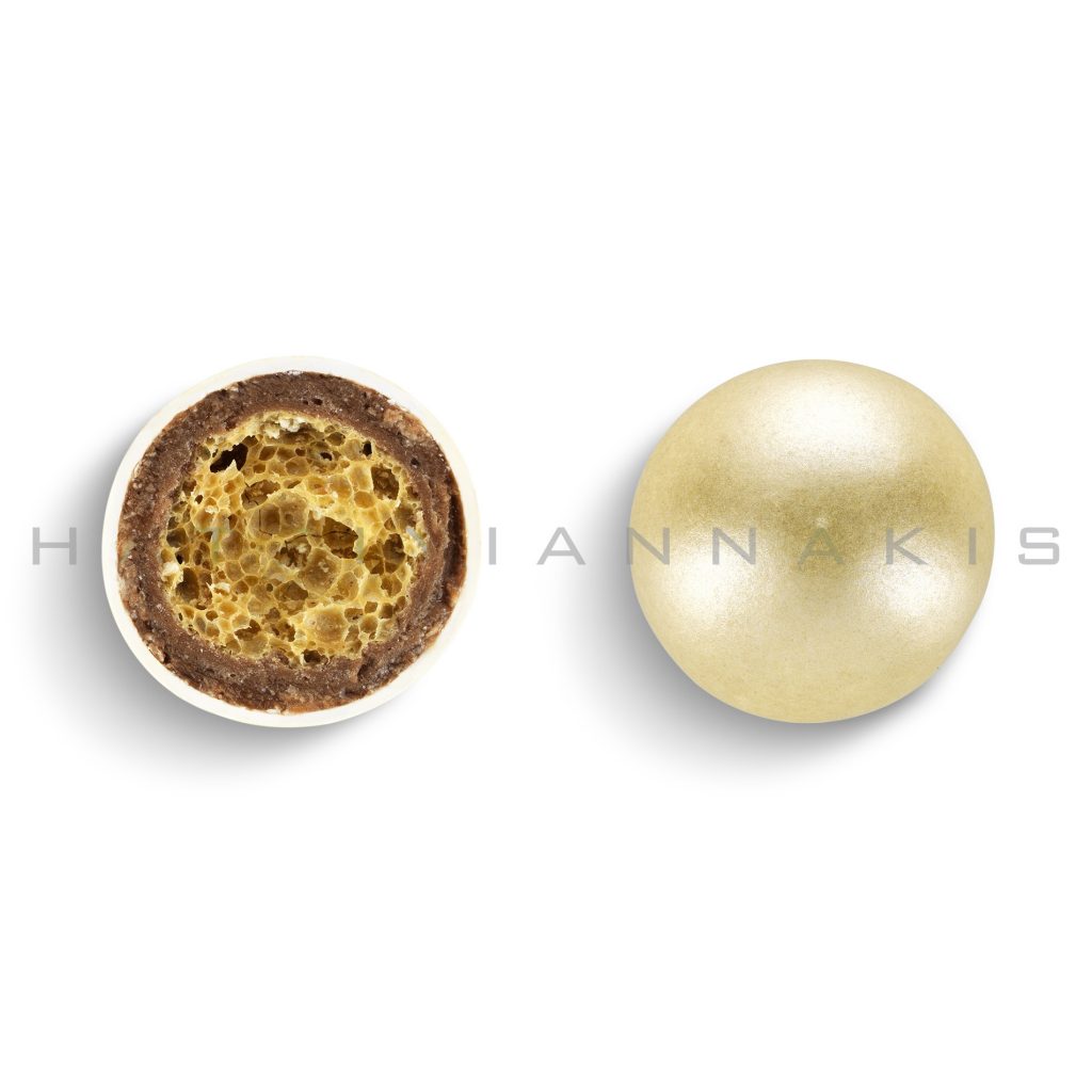 crispy core of cereals & milk chocholate with a thin layer of sugar coating-ivoire pearlscent